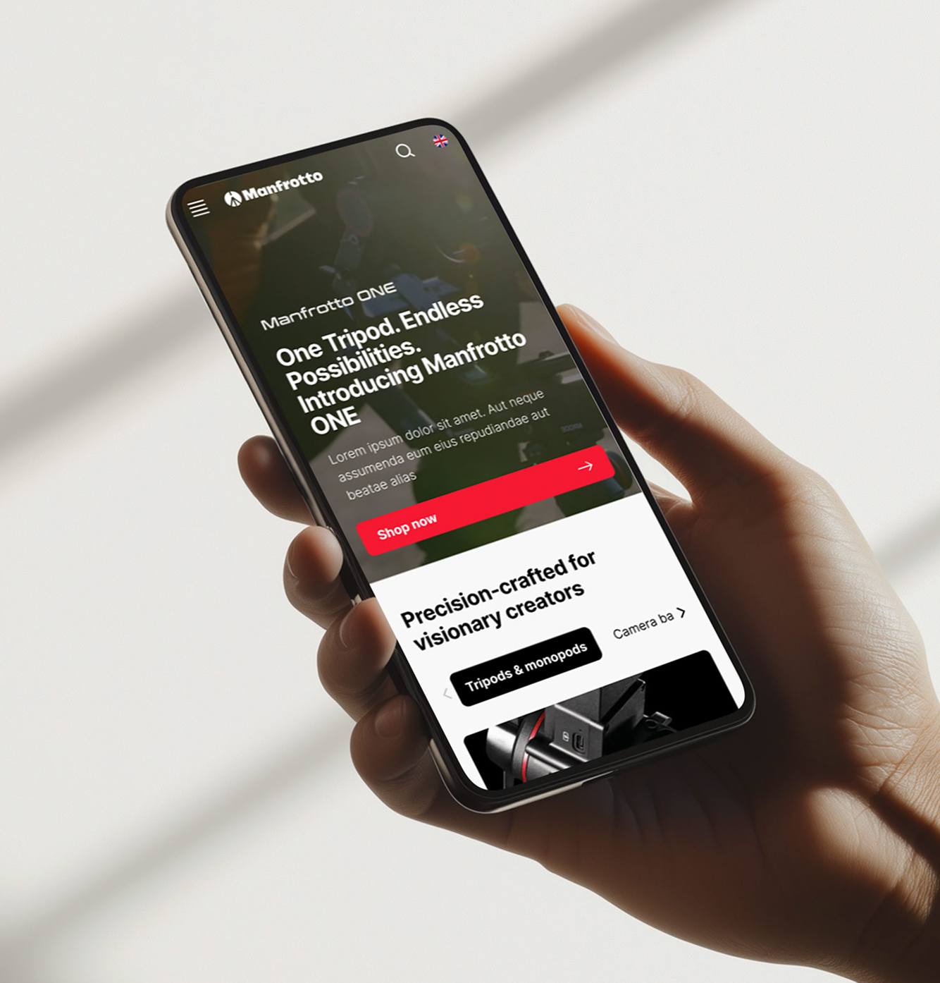 Manfrotto ONE mobile homepage shown on a phone held in hand